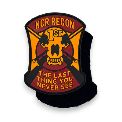 Tactical morale patch featuring the NCR Recon insignia and the iconic sniper motto "The Last Thing You Never See"