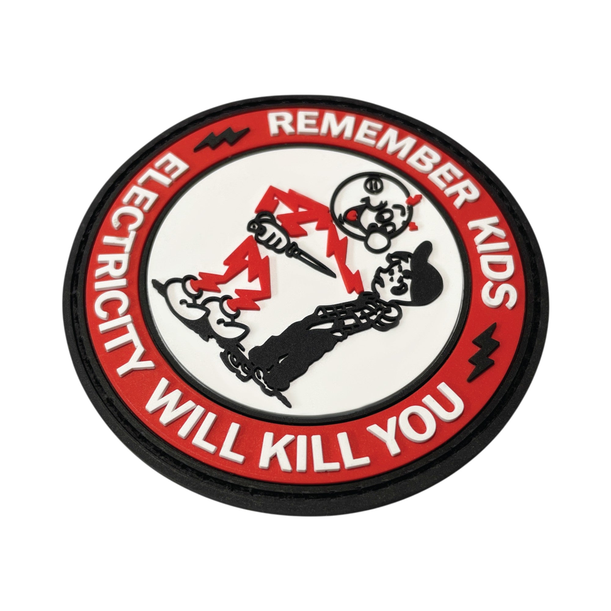 Circular PVC morale patch featuring a dark humor parody of Reddy Kilowatt and a kid, surrounded by a red border with the text "Remember Kids Electricity Will Kill You".