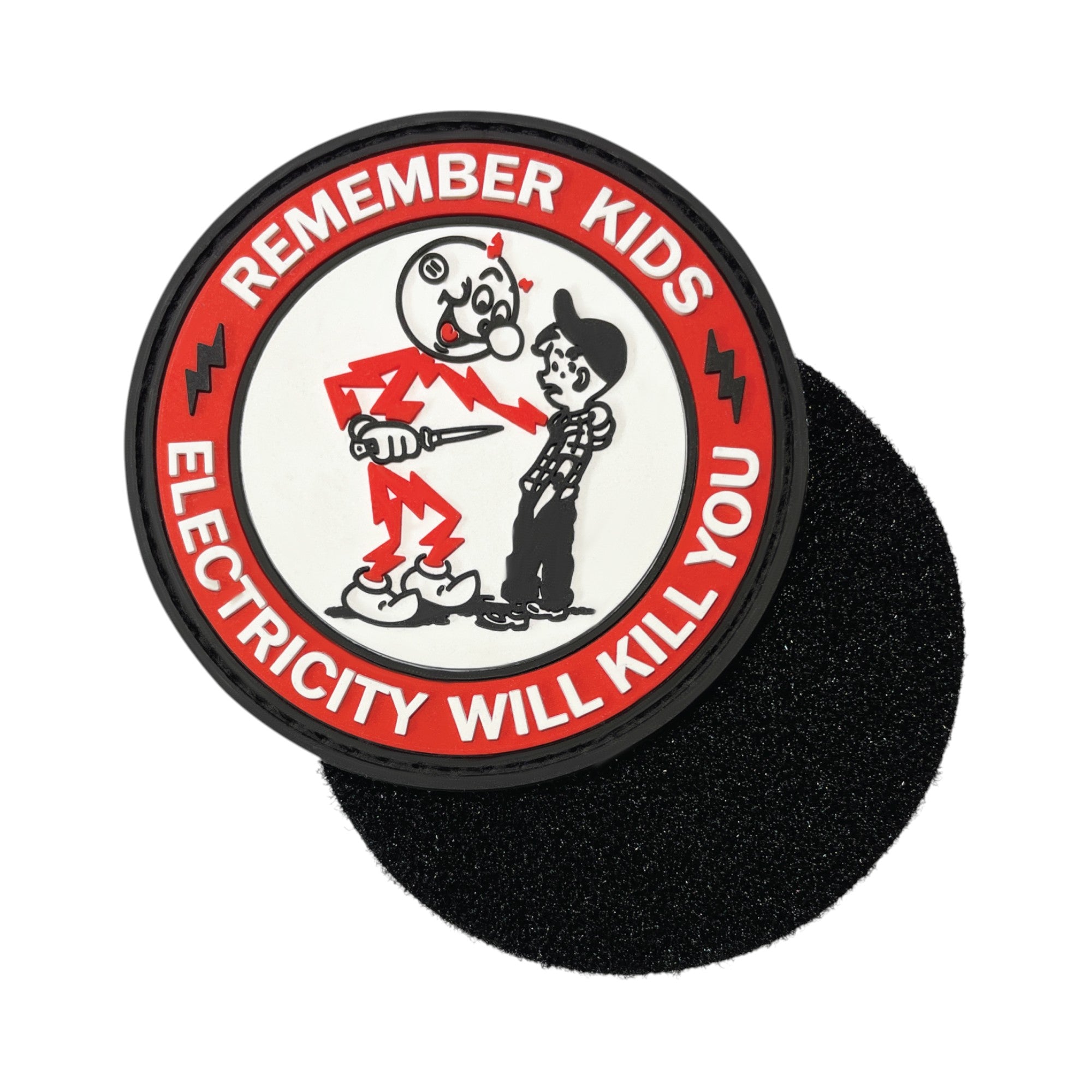 Circular PVC morale patch featuring a dark humor parody of Reddy Kilowatt and a kid, surrounded by a red border with the text "Remember Kids Electricity Will Kill You".