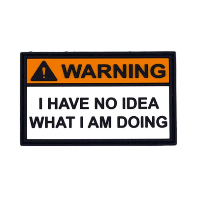 Funny PVC morale patch in a warning sign style featuring the text "Warning: I Have No Idea What I Am Doing" with a hook-and-loop backing for tactical gear