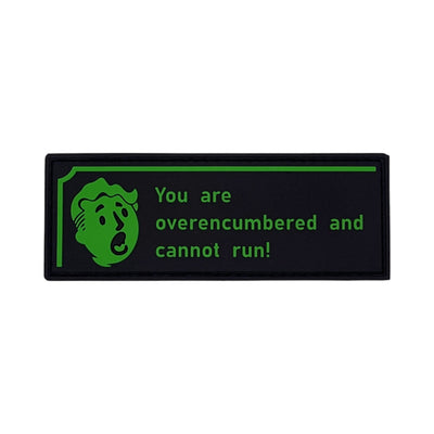 Black rectangular PVC morale patch featuring bright green text that reads "You are overencumbered and cannot run!" next to an exhausted retro cartoon gamer face.