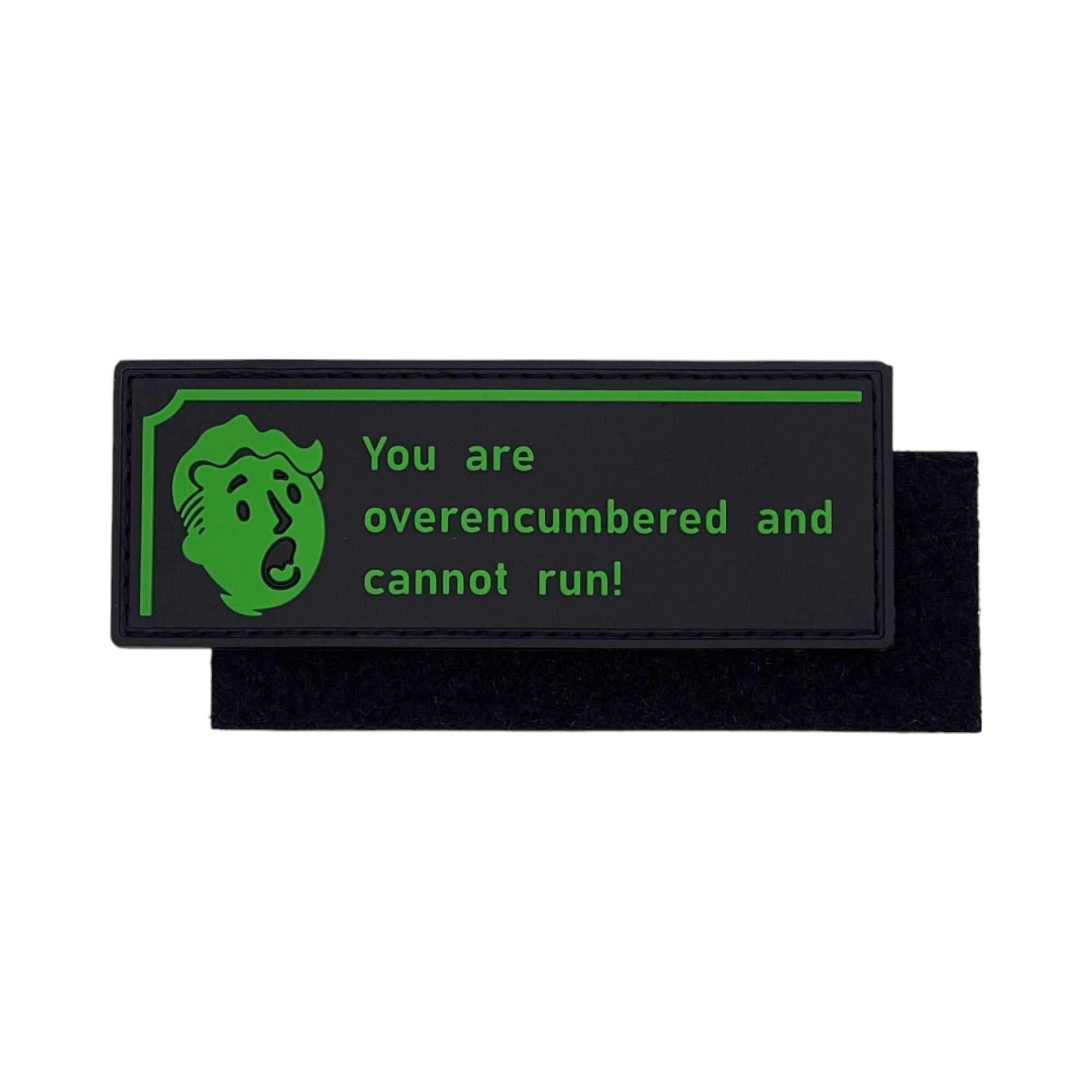 Black rectangular PVC morale patch featuring bright green text that reads "You are overencumbered and cannot run!" next to an exhausted retro cartoon gamer face.