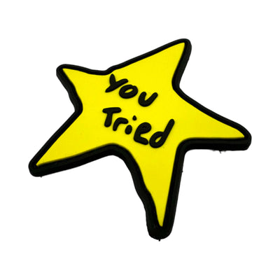 Yellow doodle-style star morale patch with a black border and the words "You Tried" written in the center in a handwritten black font.